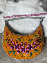 Load image into Gallery viewer, Crescent shaped, sage green purse with caribou hair tufting on moose hide.
