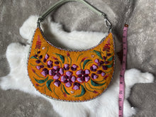 Load image into Gallery viewer, Crescent shaped, sage green purse with caribou hair tufting on moose hide.
