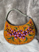 Load image into Gallery viewer, Crescent shaped, sage green purse with caribou hair tufting on moose hide.
